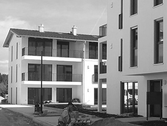 Geschosswohnungsbau am Isarstausee – 7 Mehrfamilienhäuser mit ca. 60 Wohneinheiten in Wackersberg, „Am Hoheneck“; Bauherr: Gemeinde Wackersberg